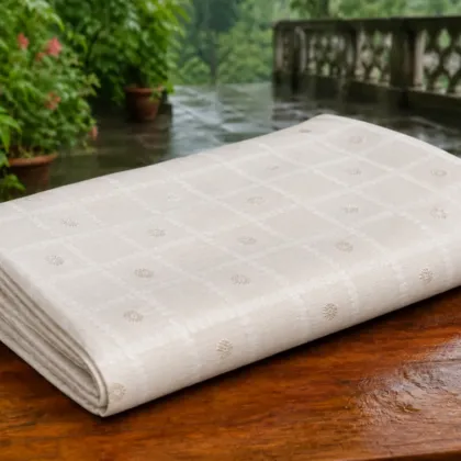 KashiFab Cotton Jacquard Zari Banarasi Fabric folded on table - Banaras fabric cover