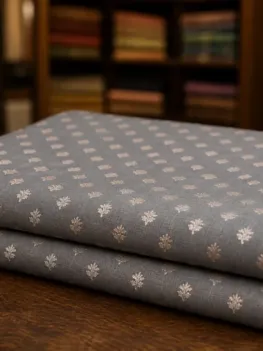 KashiFab Cotton Jacquard Zari Banarasi Fabric folded on table - Banaras fabric cover