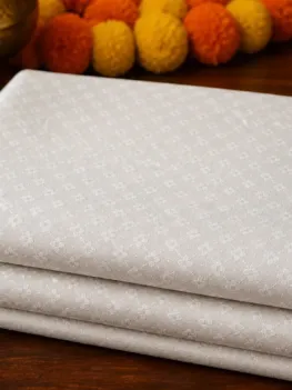 KashiFab Cotton Jacquard Zari Banarasi Fabric folded on table - Banaras fabric cover