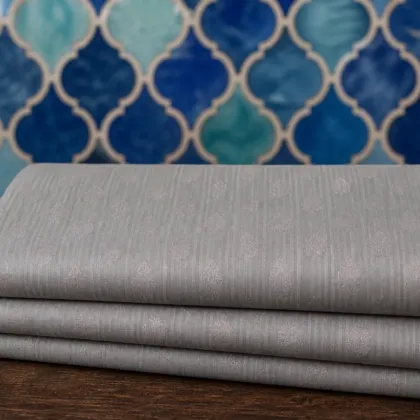 KashiFab Cotton Jacquard Zari Banarasi Fabric folded on table - Banaras fabric cover
