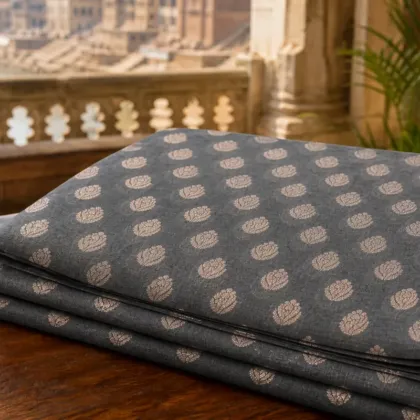 KashiFab Cotton Jacquard Zari Banarasi Fabric folded on table - Banaras fabric cover