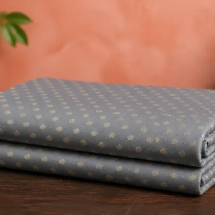 KashiFab Cotton Jacquard Zari Banarasi Fabric folded on table - Banaras fabric cover
