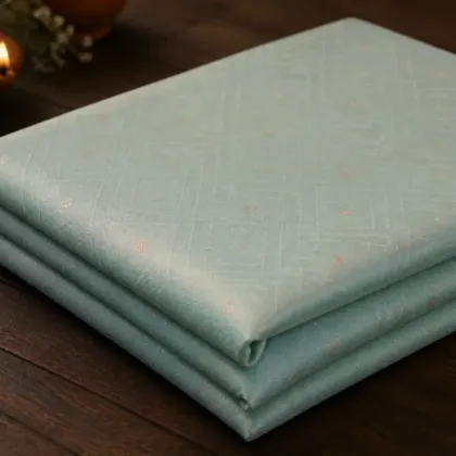 KashiFab Cotton Jacquard Zari Banarasi Fabric folded on table - Banaras fabric cover