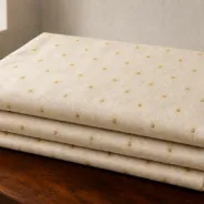 KashiFab Banarasi Katan Spun Meena Brocade folded on table - Banaras fabric cover
