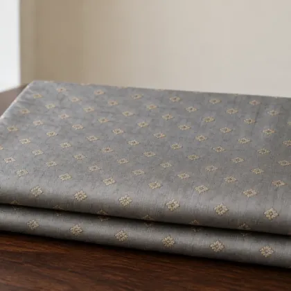 KashiFab Banarasi Katan Spun Meena Brocade folded on table - Banaras fabric cover