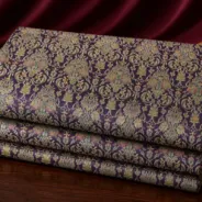 KashiFab Banarasi Kimkhab Brocade folded on table - Banaras fabric cover