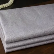 KashiFab Banarasi Kimkhab Brocade folded on table - Banaras fabric cover