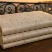 KashiFab Banarasi Kimkhab Brocade folded on table - Banaras fabric cover