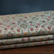 KashiFab Banarasi Kimkhab Brocade folded on table - Banaras fabric cover