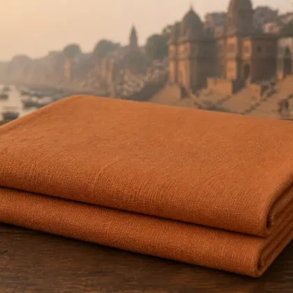 KashiFab Banarasi Pure Matka Silk folded on table - Banaras fabric cover