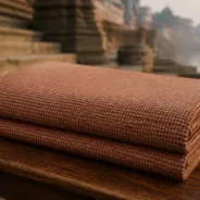 KashiFab Banarasi Pure Matka Silk folded on table - Banaras fabric cover