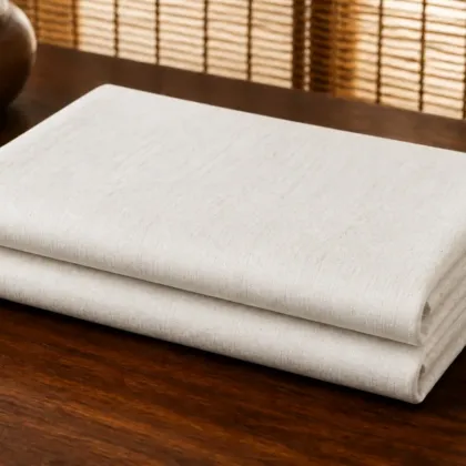 KashiFab Banarasi Pure Matka Silk folded on table - Banaras fabric cover