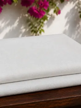 KashiFab Banarasi Pure Matka Silk folded on table - Banaras fabric cover