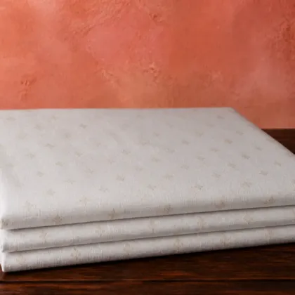 KashiFab Banarasi Pure Munga Zari Meena Buti folded on table - Banaras fabric cover