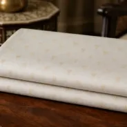 KashiFab Banarasi Pure Munga Zari Meena Buti folded on table - Banaras fabric cover
