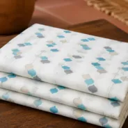 KashiFab Banarasi Rangkat Royale Brocade folded on table - Banaras fabric cover