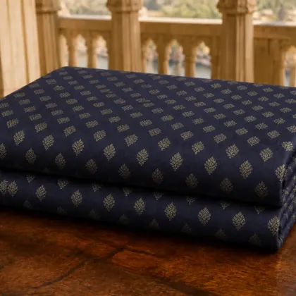KashiFab Banarasi Pure Raw Silk Zari Booti folded on table - Banaras fabric cover