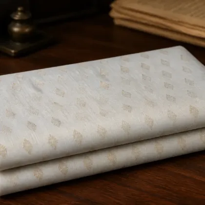 KashiFab Banarasi Pure Raw Silk Zari Booti folded on table - Banaras fabric cover