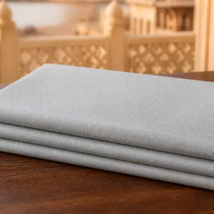 KashiFab Banarasi Pure Resham Cotton Meena Jacquard folded on table - Banaras fabric cover