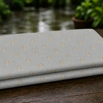 KashiFab Banarasi Pure Resham Cotton Meena Jacquard folded on table - Banaras fabric cover