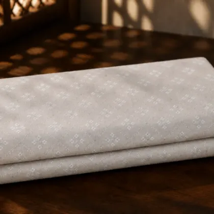 KashiFab Banarasi Pure Resham Cotton Meena Jacquard folded on table - Banaras fabric cover