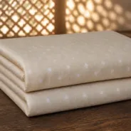 KashiFab Banarasi Pure Resham Cotton Meena Jacquard folded on table - Banaras fabric cover