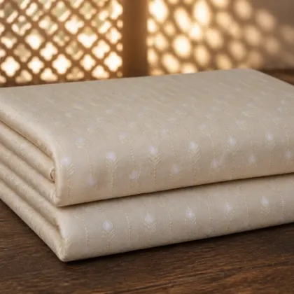 KashiFab Banarasi Pure Resham Cotton Meena Jacquard folded on table - Banaras fabric cover