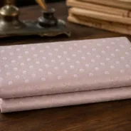 KashiFab Banarasi Pure Resham Cotton Meena Jacquard folded on table - Banaras fabric cover