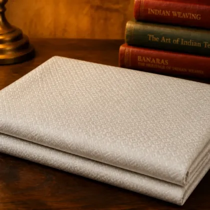 KashiFab Banarasi Pure Resham Cotton Meena Jacquard folded on table - Banaras fabric cover