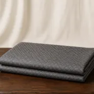 KashiFab Banarasi Pure Resham Cotton Meena Jacquard folded on table - Banaras fabric cover