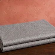 KashiFab Banarasi Pure Resham Cotton Meena Jacquard folded on table - Banaras fabric cover