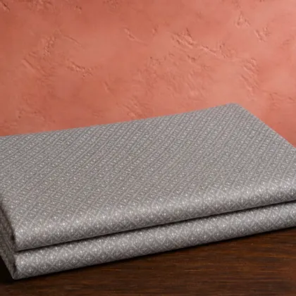 KashiFab Banarasi Pure Resham Cotton Meena Jacquard folded on table - Banaras fabric cover