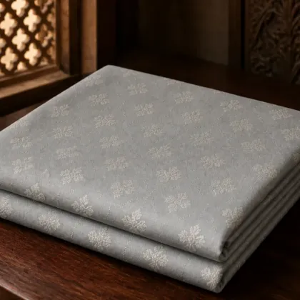 KashiFab Banarasi Pure Resham Cotton Meena Jacquard folded on table - Banaras fabric cover