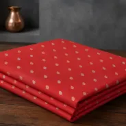 KashiFab Banarasi Resham Zari Meena Brocade folded on table - Banaras fabric cover