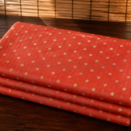 KashiFab Banarasi Resham Zari Meena Brocade folded on table - Banaras fabric cover