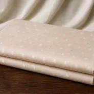KashiFab Banarasi Resham Zari Meena Brocade folded on table - Banaras fabric cover