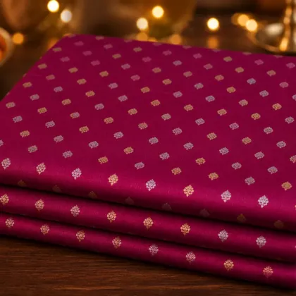 KashiFab Banarasi Resham Zari Meena Brocade folded on table - Banaras fabric cover