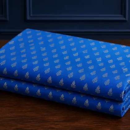 KashiFab Banarasi Resham Zari Meena Brocade folded on table - Banaras fabric cover