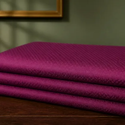 KashiFab Pure Resham Spun Silk Banarasi Jacquard folded on table - Banaras fabric cover