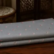 KashiFab Banarasi Sartan Zari Meena Brocade folded on table - Banaras fabric cover