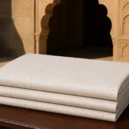 KashiFab Banarasi Sartan Zari Meena Brocade folded on table - Banaras fabric cover