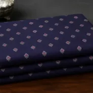KashiFab Banarasi Sartan Zari Meena Brocade folded on table - Banaras fabric cover