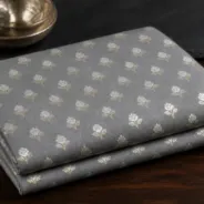 KashiFab Banarasi Sartan Zari Meena Brocade folded on table - Banaras fabric cover