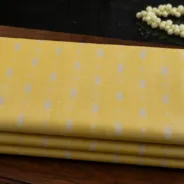 KashiFab Banarasi Sartan Zari Meena Brocade folded on table - Banaras fabric cover