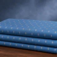 KashiFab Banarasi Sartan Zari Meena Brocade folded on table - Banaras fabric cover