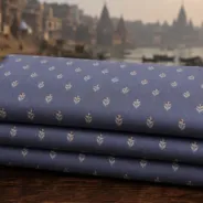 KashiFab Banarasi Sartan Zari Meena Brocade folded on table - Banaras fabric cover