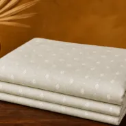 KashiFab Banarasi Sartan Zari Meena Brocade folded on table - Banaras fabric cover