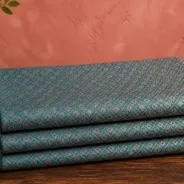 KashiFab Banarasi Vintage Brocade folded on table - Banaras fabric cover