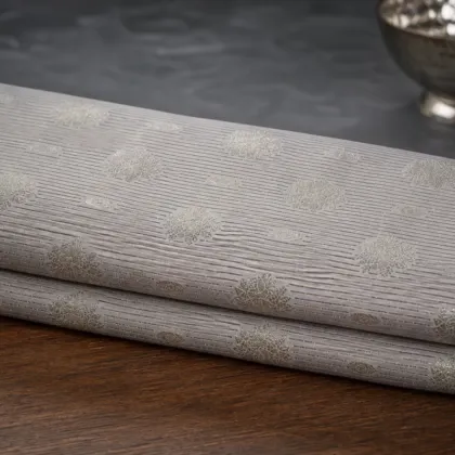 KashiFab Banarasi Vintage Brocade folded on table - Banaras fabric cover