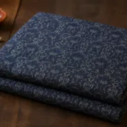 KashiFab Banarasi Fancy Yarn Viscose Jacquard folded on table - Banaras fabric cover
